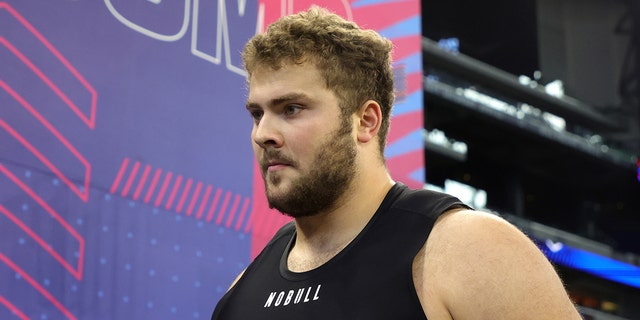 Peter Skoronski looks on during NFL Combine