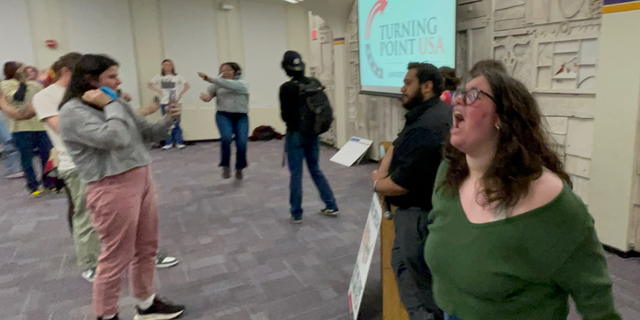 Protesters at SUNY at Albany voiced their dissent against TPUSA guest speaker Ian Haworth on April 4, 2023.