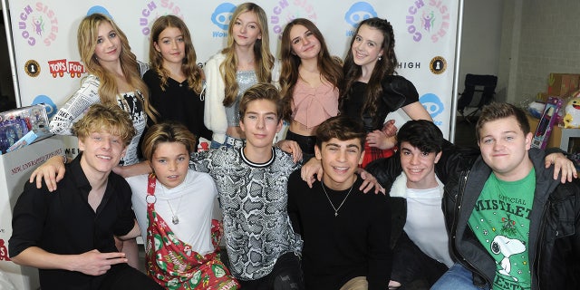 Piper Rockelle and some of her former co-stars pose at a toy drive