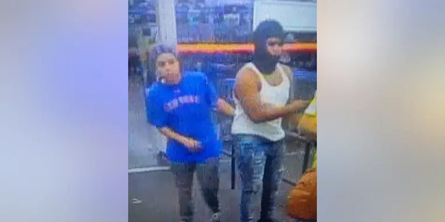 Police in Florida say the male on the right attempted to load and steal a BB gun when they were contacted and the store was evactuated.
