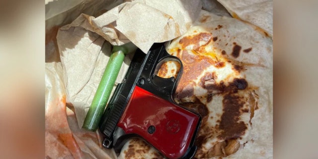 Devin P. Mitchell folded the gun into the quesadilla when police in Picayune stopped him and his driver for a traffic violation.