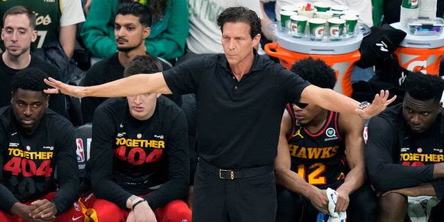 Atlanta Hawks head coach Quin Snyder calls to his players while facing the Boston Celtics during Game 2 in the first round of the NBA basketball playoffs, Tuesday, April 18, 2023, in Boston. 