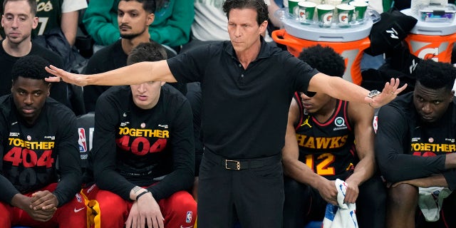 Atlanta Hawks head coach Quin Snyder calls to his players while facing the Boston Celtics during Game 2 in the first round of the NBA basketball playoffs, Tuesday, April 18, 2023, in Boston.