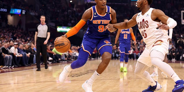 RJ Barrett (9) of the New York Knicks handles the ball during a game against the Cleveland Cavaliers March 31, 2023, at Rocket Mortgage FieldHouse in Cleveland.