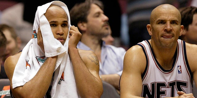 New Jersey Nets forward Richard Jefferson, left, on the bench during the Houston Rockets game in East Rutherford, New Jersey, Dec. 27, 2006.