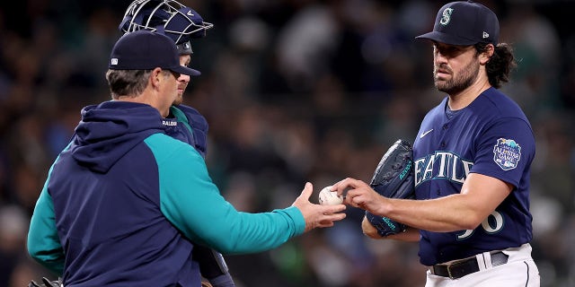 Robbie Ray hands off ball