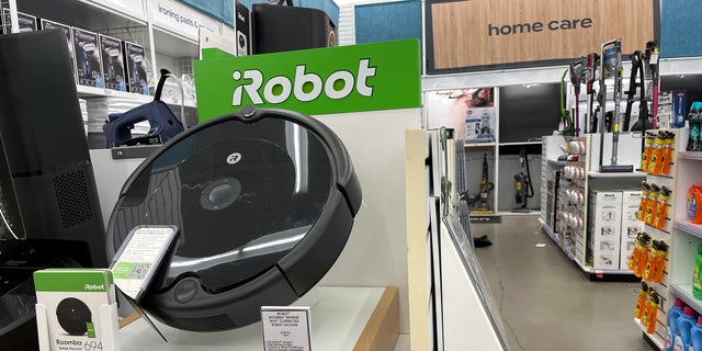 Roomba robot vacuums made by iRobot are displayed on a shelf at a Bed Bath and Beyond store on Aug. 5, 2022 in Larkspur, California.