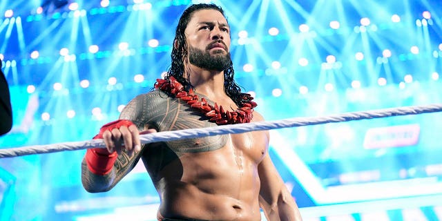 Roman Reigns enters the ring to face Brock Lesnar during WrestleMania 38 in Arlington, Texas on April 3, 2022. Reigns and Cody Rhodes will be in the main event of WrestleMania 39 on April 2, 2023 in Los Angeles. 