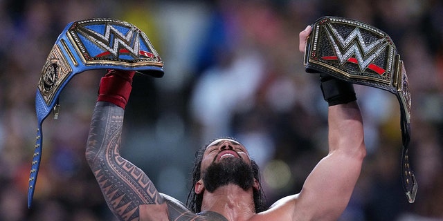 Roman Reigns celebrates during WrestleMania Night 2 at SOFi Stadium.