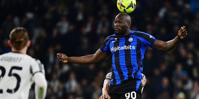 Inter's Romelu Lukaku heads the ball during the Italian cup semifinal first leg soccer match between Juventus and Inter Milan, at the Allianz Stadium, in Turin, Italy, Tuesday, April 4, 2023.