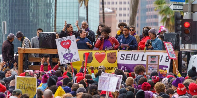FILE: Union leaders address thousands of Los Angeles Unified School District teachers and Service Employees International Union 99 members during a rally outside the LAUSD headquarters in Los Angeles on March 21, 2023.