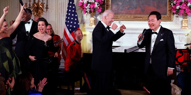 South Korean President Yoon Suk-yeol sings