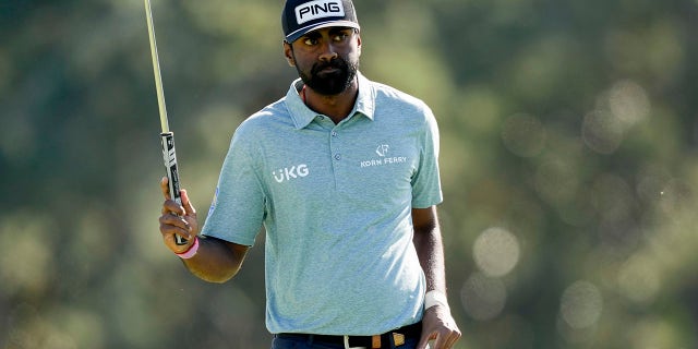 Sahith Theegala waves after his putt on the 18th hole during the final round of the Masters golf tournament at Augusta National Golf Club on Sunday, April 9, 2023, in Augusta, Ga.