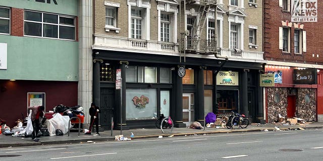 People inhabit encampments on the streets of San Francisco's Mission District.
