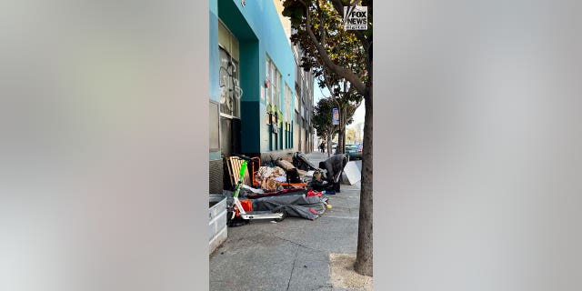 People inhabit encampments on the streets of San Franciscos Mission District