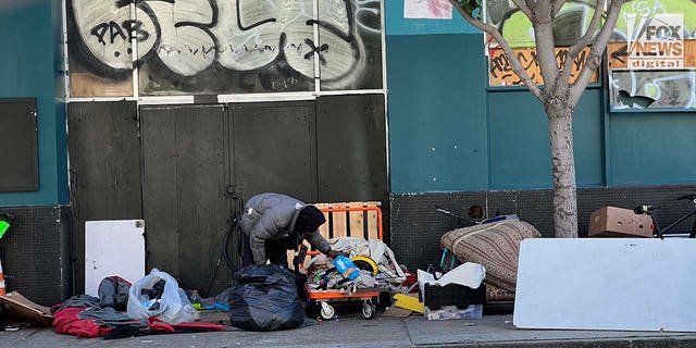 People inhabit encampments on the streets of San Francisco's Mission District.
