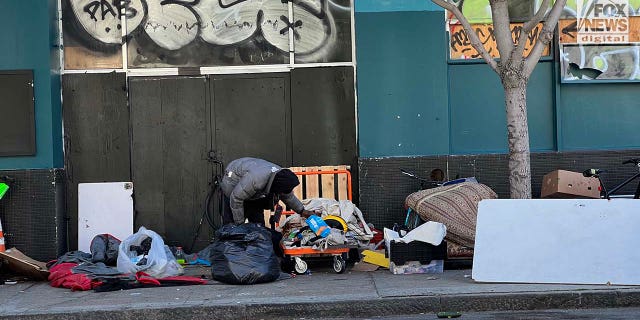 People inhabit encampments on the streets of San Francisco's Mission District.