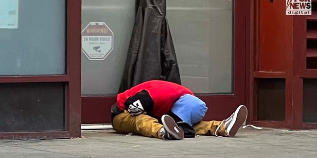 People inhabit encampments on the streets of San Francisco's Tenderloin District.