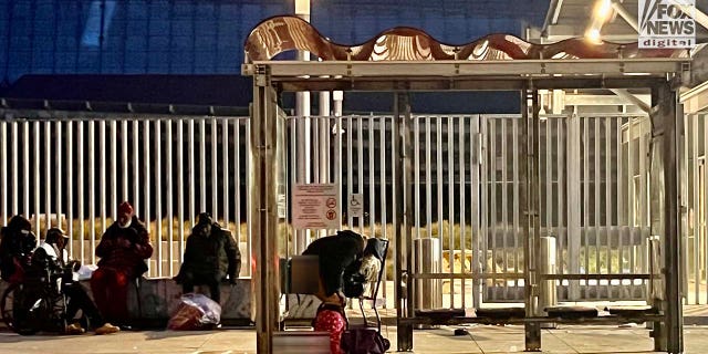 People inhabit encampments on the streets of San Francisco's Tenderloin District.