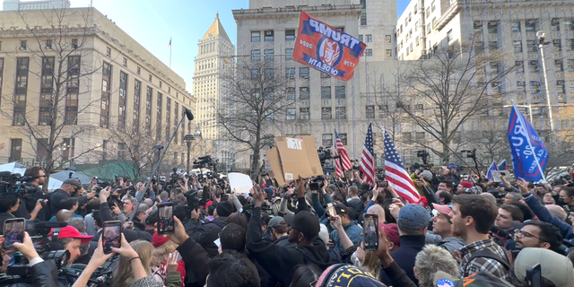 Protestors outside the courthouse where President Trump was arraigned on April 4. 