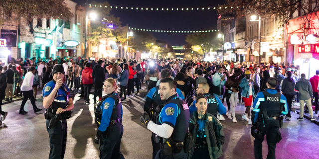 Austin Police patrolling 6th Street, one of the busiest nightlife districts in Austin, Texas. 