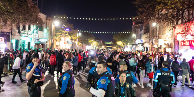Austin Police patrolling 6th Street, one of the busiest nightlife districts in Austin, Texas.