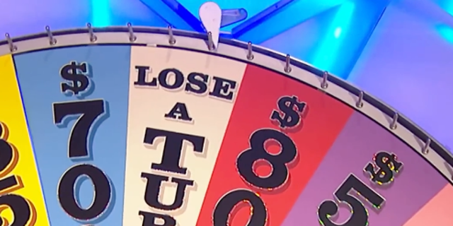A "Wheel of Fortune" recap showed player Justin’s third spin landed on a "Lose a Turn" wedge.