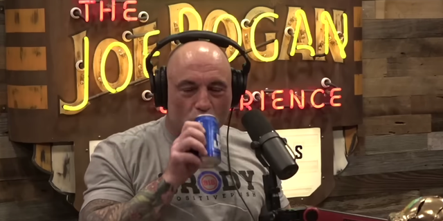 Joe Rogan sips a Bud Light on his podcast on April 12, 2023.