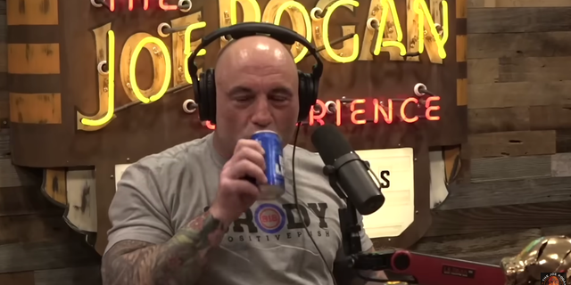 Joe Rogan sips a Bud Light on his podcast on April 12, 2023.