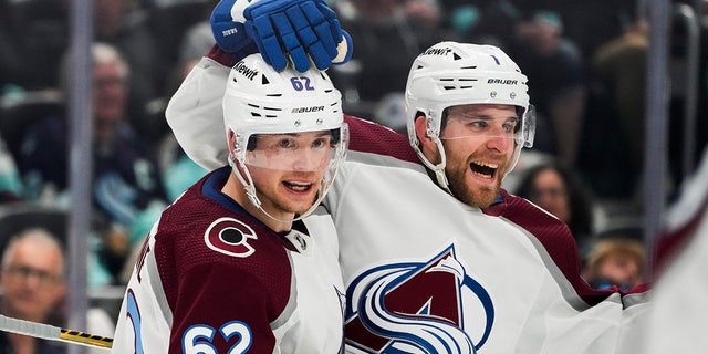 Colorado Avalanche players celebrates after a goal