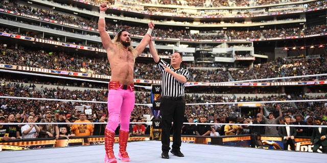 Seth Rollins defeats Logan Paul.