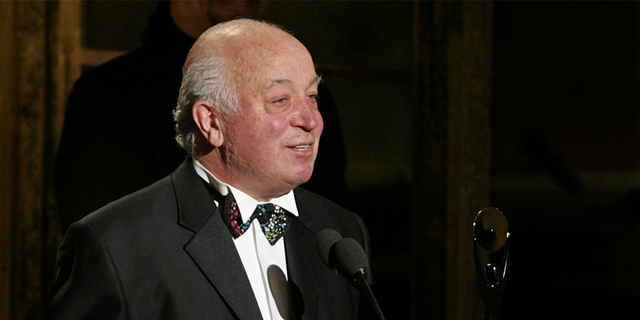 Seymour Stein accepts his award during the Rock and Roll Hall of Fame induction ceremony, Monday, March 14, 2005, in New York.