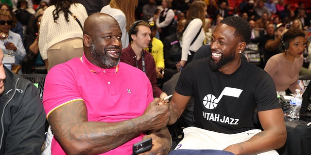 Shaquille O'Neal poses with Dwyane Wade at the Ruffles NBA All-Star Game as part of the 2023 NBA All Star Weekend on Friday, Feb. 17, 2023, at the John M.