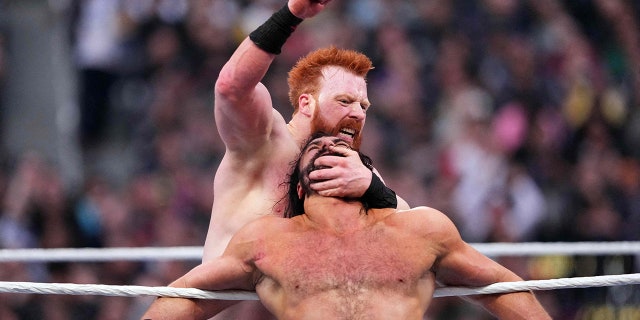 Sheamus chops Drew McIntyre during WrestleMania at SoFi Stadium, April 2, 2023, in Inglewood, California.