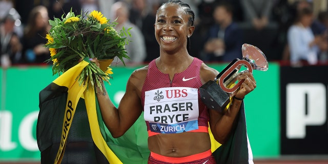 Shelly-Ann Fraser-Pryce celebrates win