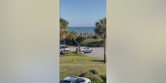 Beachgoers were seen fleeing after six people were shot Friday, April 7, 2023, at Isle of Palms, South Carolina. 