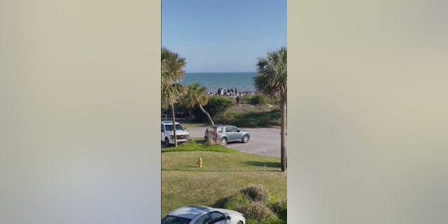 Beachgoers were seen fleeing after six people were shot Friday, April 7, 2023, at Isle of Palms, South Carolina.