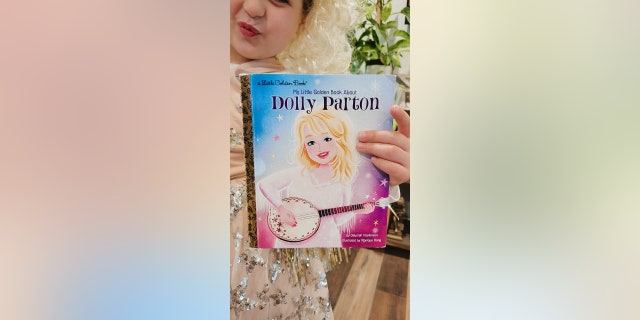 Stella's assignment was to dress up as a literary character, so she chose the country music legend as her inspiration.