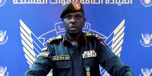 Sudanese Armed Forces spokesman Brig. Nabil Abdullah reads a statement warning of conflict after the recent deployment of powerful paramilitary forces in the country's capital and other cities. Tensions between the military and the paramilitary have escalated in recent months.