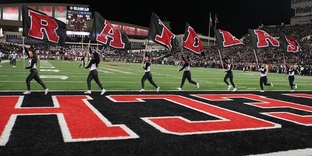 Texas Tech Red Raiders cheerleaders celebrate a touchdown against the Baylor Bears at Jones AT&T Stadium and Cody Campbell Field in Lubbock, Texas on October 29, 2022.