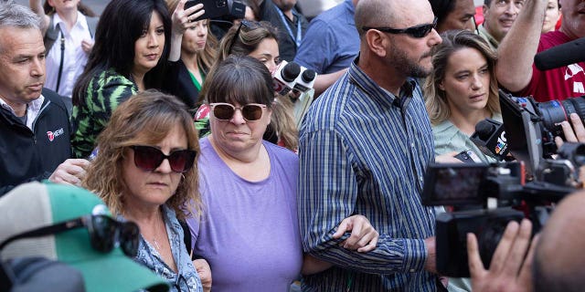 APRIL 14: Relatives of Jack Teixeira leave John Joseph Moakley United States Courthouse following his arraignment on April 14, 2023, in Boston, Massachusetts. Teixeria, a Massachusetts Air National Guardsman was charged on two counts: unauthorized retention and transmission of national defense information and unauthorized removal and retention of classified documents or material.