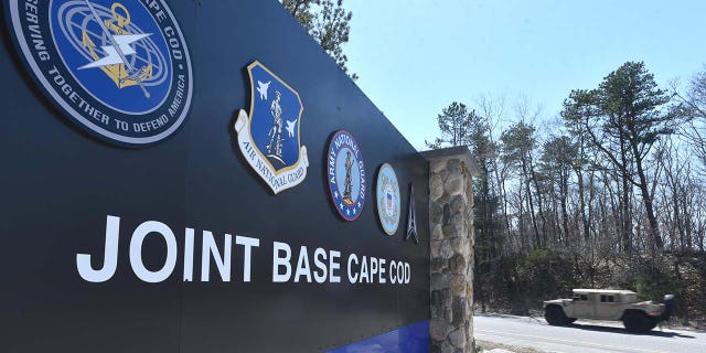 A military vehicle heads onto Joint Base Cape Cod on April 13, 2023, where Massachusetts Air National Guardsman Jack Teixeira worked