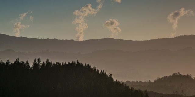 Steam rises from the Calpine steam power plants located on a ridge at The Geysers on April 28, 2014, near Healdsburg, California.