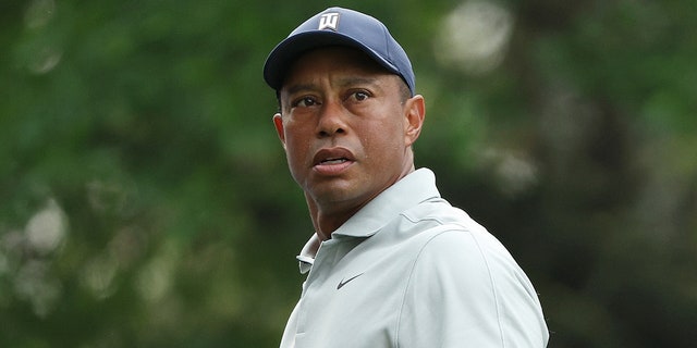 Tiger Woods looks on from the fourth tee during a practice round prior to the 2023 Masters Tournament at Augusta National Golf Club on April 4, 2023 in Augusta, Georgia.