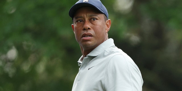 Tiger Woods looks on from the fourth tee during a practice round prior to the 2023 Masters Tournament at Augusta National Golf Club on April 4, 2023 in Augusta, Georgia.