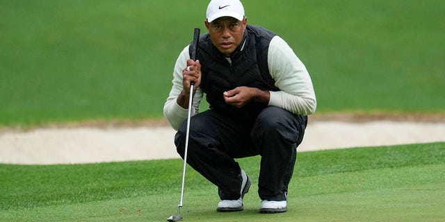 Tiger Woods putst on the 16th hole during the Masters on Saturday, April 8, 2023 in Augusta, Georgia.