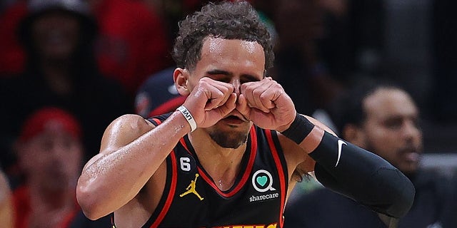Trae Young makes crying eyes