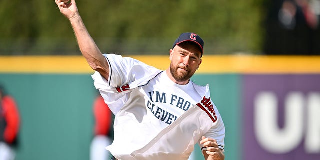 Cleveland native and Kansas City Chiefs tight end Travis Kelce throws out the first pitch before a game between the Cleveland Guardians and the Seattle Mariners at Progressive Field April 7, 2023, in Cleveland.