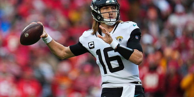 Trevor Lawrence of the Jacksonville Jaguars throws against the Chiefs at GEHA Field at Arrowhead Stadium on January 21, 2023 in Kansas City, Missouri.