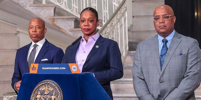 New York City Mayor Eric Adams (L) and New York City Police Department (NYPD) Commissioner Keechant Sewell (R) make a public safety-related announcement ahead of former US President Donald Trump's arrival